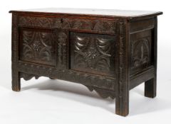 An oak coffer, late 17th or 18th century,