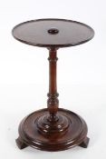 A mahogany circular occasional or wine table,