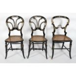 Three Victorian black lacquered chairs, circa 1880,