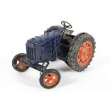 A Chad Valley 1/16 scale Fordson clockwork tractor, in blue and orange,