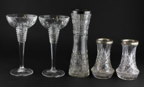A silver-topped cut-glass flower vase,