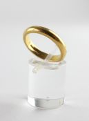 A yellow metal heavy court shape wedding ring, 3.8mm.