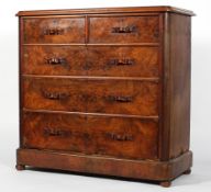 A Victorian veneered walnut chest of drawers, circa 1880, with ribbon-carved handles,