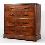 A Victorian veneered walnut chest of drawers, circa 1880, with ribbon-carved handles,