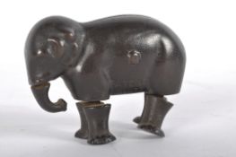 A novelty Victorian cast iron ramp walking elephant, Ives Toy Company, Connecticut,