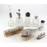 A silver and white-metal mounted dressing table set, including brushes, atomiser,