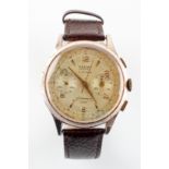 A gold plated Cauny Prima wristwatch. 17 Jewel (Rubis) manual wind movement. Chronograph feature.