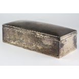 A Victorian silver cigarette box of rectangular form, hallmarks rubbed, 18cm wide,