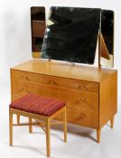 A Meredew 1960's vintage golden oak dressing table chest having a triptych mirror