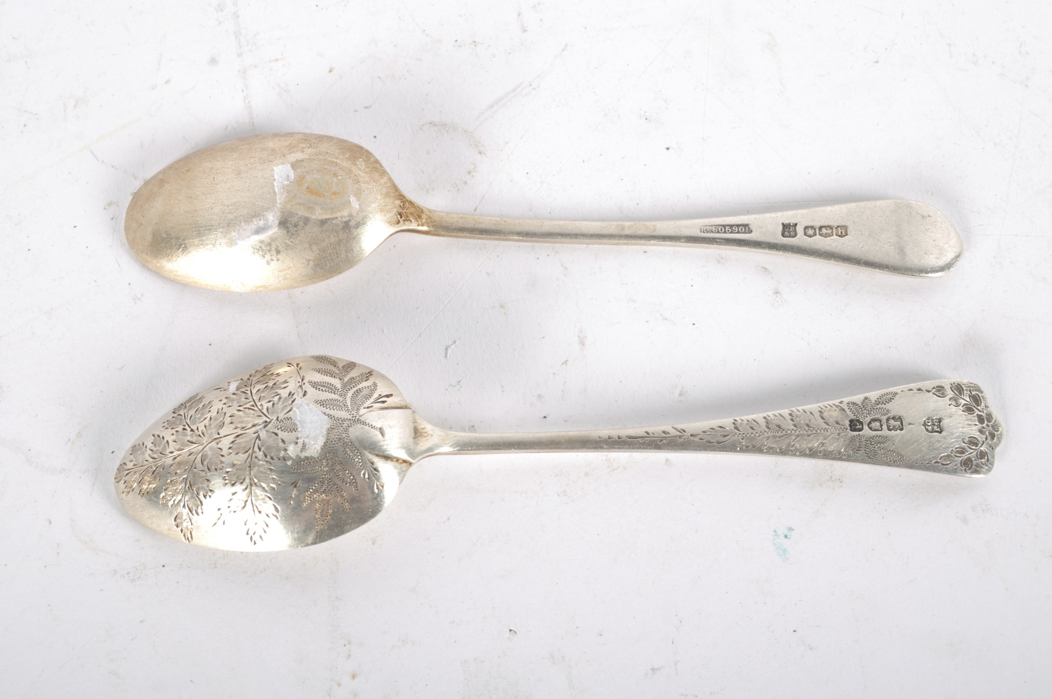 Two pairs of sugar tongs, one being Georgian with bright cut decoration, - Image 2 of 2