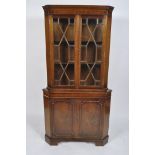 A Georgian style mahogany corner cabinet,