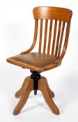 An oak captains or office chair, early/mid 20th century,