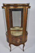 A French gilt lacquered vitrine, early 20th century,