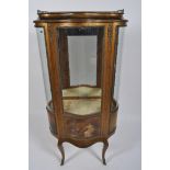 A French gilt lacquered vitrine, early 20th century,