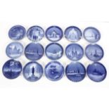 A collection of fourteen Royal Copenhagen Christmas plates, dated 1920 -30's, in blue and white,