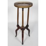 A mahogany and gilt metal jardiniere stand, the galleried top inset with rouge marble,