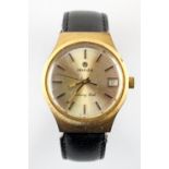 A gold plated wristwatch. Circular champagne dial, signed Imado,