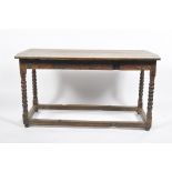 An oak table, 18th century and later, the planked top bobbin turned legs and block stretchers,