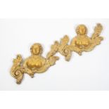 A carved giltwood wall-mount, 20th century,