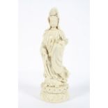 A Chinese blanc de chine figure of a Guanyin, 20th century, impressed seal mark to reverse,