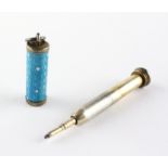 A late 19th/early 20th century yellow metal and enamel propelling pencil,