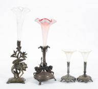 A silver plated and glass flower trumpet, the base cast as a stork,