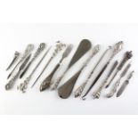 A collection of assorted silver and silver plated items, including shoehorns,