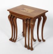 A nest of three tables, 20th century, inlaid with a coastal scene, bird and turtle, 55cm high,