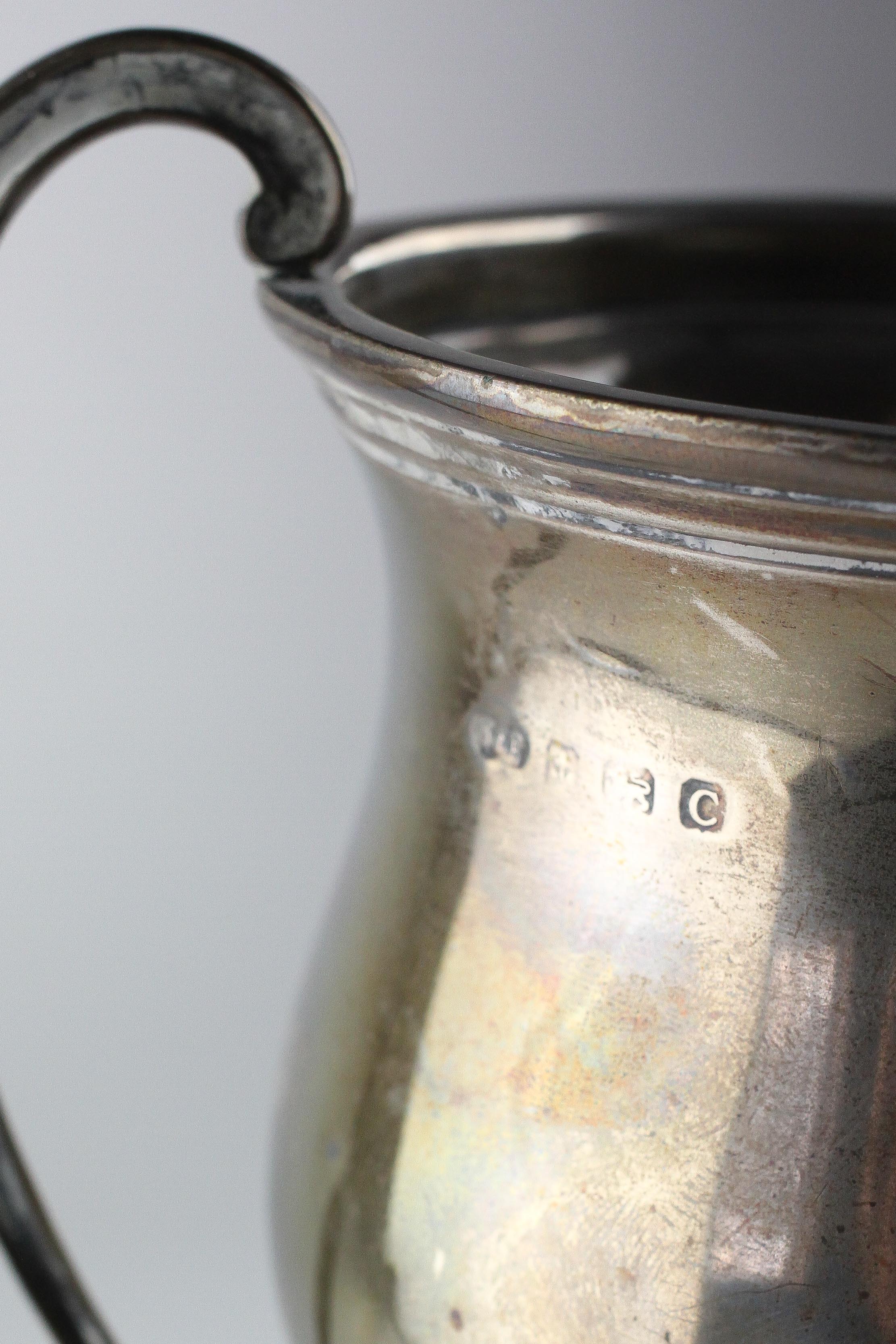 A George V silver twin handled trophy cup, mounted upon base, - Image 2 of 2