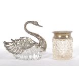 A silver mounted cut glass novelty bon bon dish in the form of a swan with articulated wings,