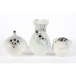 A group of three Studio pottery vases, each pierced with apertures,