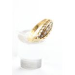 A yellow metal half hoop ring set with five graduated old European cut diamonds,