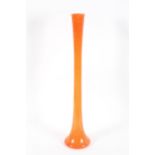 A large Murano cased orange glass trumpet vase,