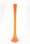 A large Murano cased orange glass trumpet vase,