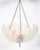 An art deco style moulded and frosted glass ceiling light, with remains of pink tinting,