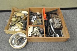 A collection of keys, drawer pulls,