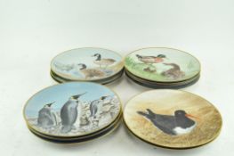 A set of 12 plates with figures of birds by Danbury Mint