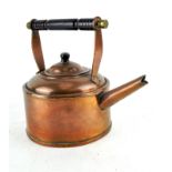 An Arts and Crafts copper kettle and cover, late 19th century, with turned wooden handle,