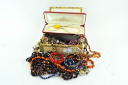 A 'Newquay pearl' necklace and a cigar box containing assorted costume jewellery,