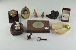 A mixed parcel of collectibles to include a Chinese bronzed figure and other items