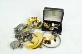 A quantity of costume jewellery including brooches and cufflink's