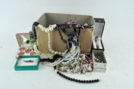 A quantity of costume jewellery, including earrings,