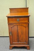 A mahogany pot cupboard,