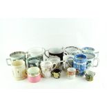 A collection of two-handled ceramic mugs, including pear ware,