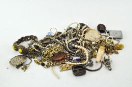 A quantity of costume jewellery including necklaces;