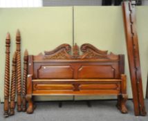 A modern mahogany bed with turned posts and flame finial's, (to take a king size mattress),