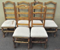 A set of six vintage ladder back style dining chairs,