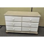 A painted chest of six drawers,