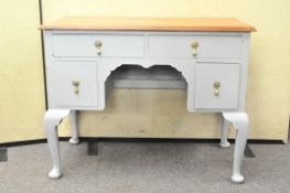 A mahogany and grey painted kneehole desk with four drawers,