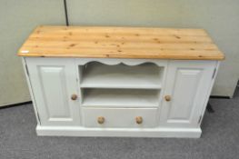 A lime painted pine side cabinet,